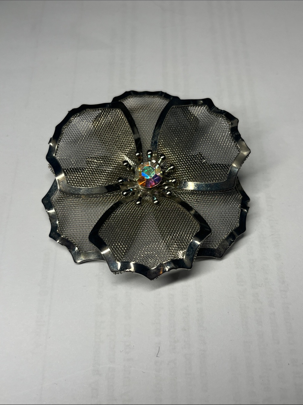 Vintage Silver-Tone Floral Brooch with Iridescent Center